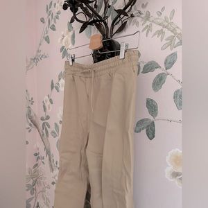 Mango Faux Leather Pants - signs of wear throughout, some damage on calf area